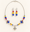 Silver-tone snake chain necklace with colorful beads, two angel-wing charms, and an airplane pendant, with matching silver-tone drop earrings
